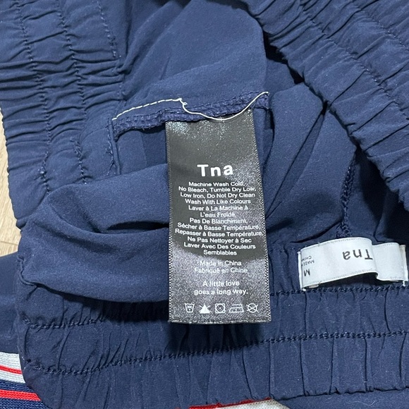 Aritzia TNA Navy Track Pants with Striped Sides - Picture 5 of 6